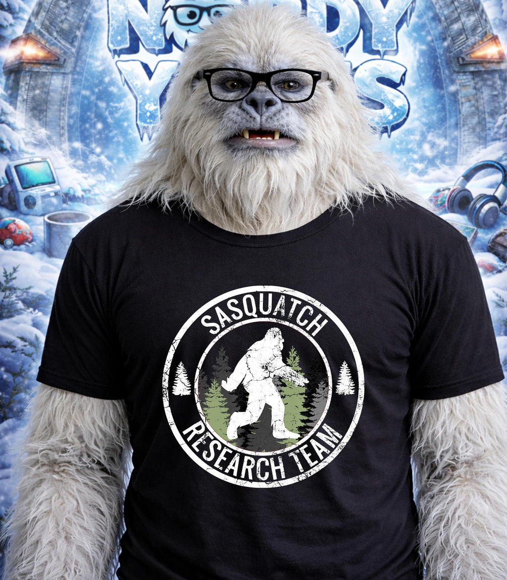 Yeti wearing glasses and a "Sasquatch Research Team" t-shirt.