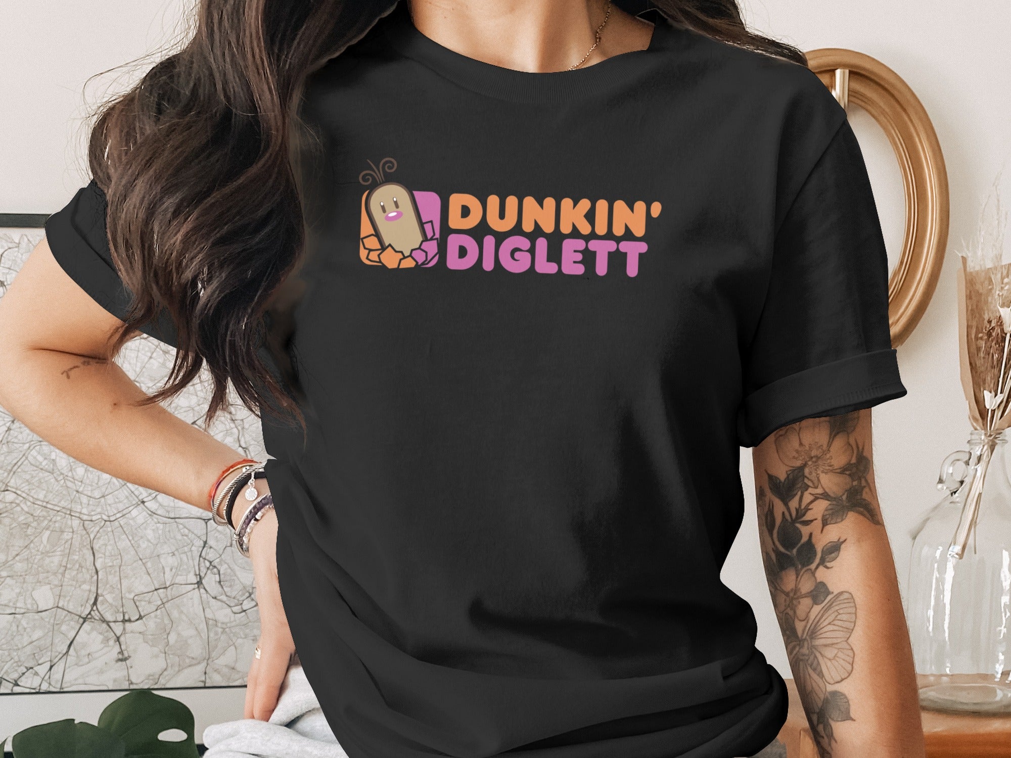 Black t-shirt with Dunkin' Diglett logo featuring a cartoon Diglett character.