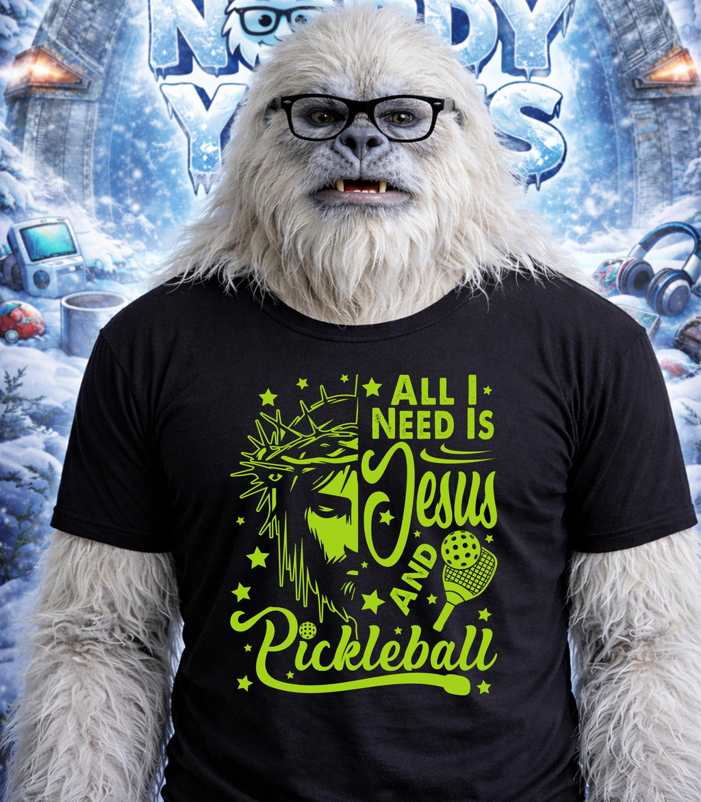 Yeti wearing glasses and a t-shirt with "All I Need is Jesus and Pickleball".