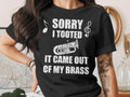 Black t-shirt with "Sorry I Tooted, It Came Out Of My Brass" and tuba graphic.