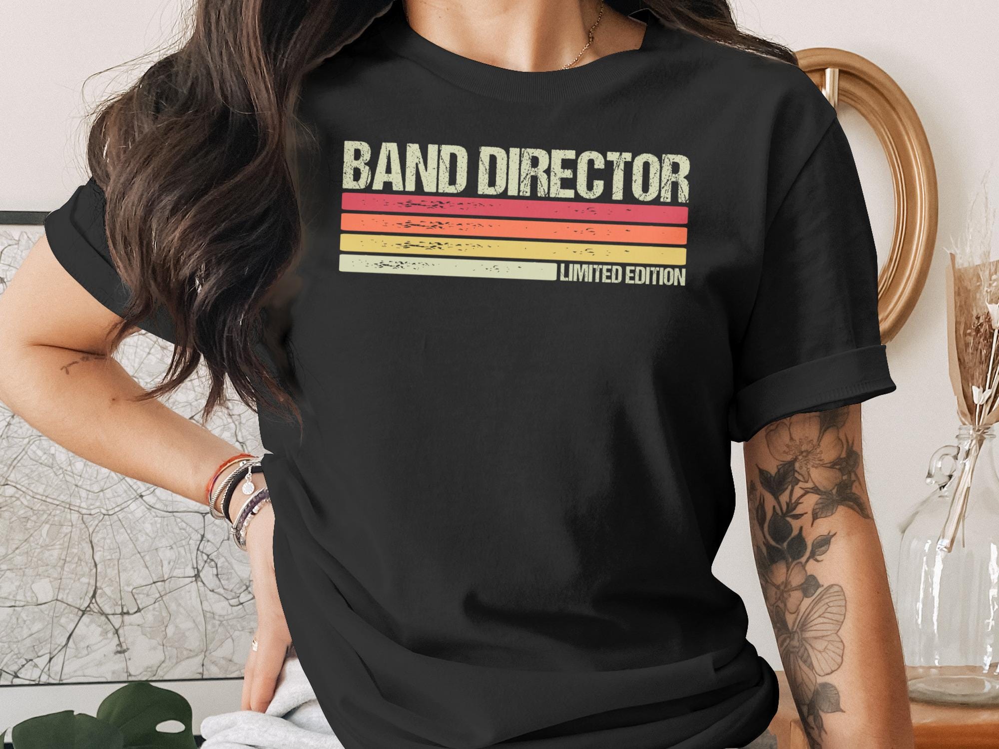 Black t-shirt with "BAND DIRECTOR" and "LIMITED EDITION" in retro stripes.