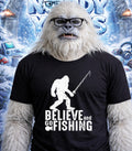 Yeti wearing glasses and a t-shirt that says "BELIEVE and GO FISHING".