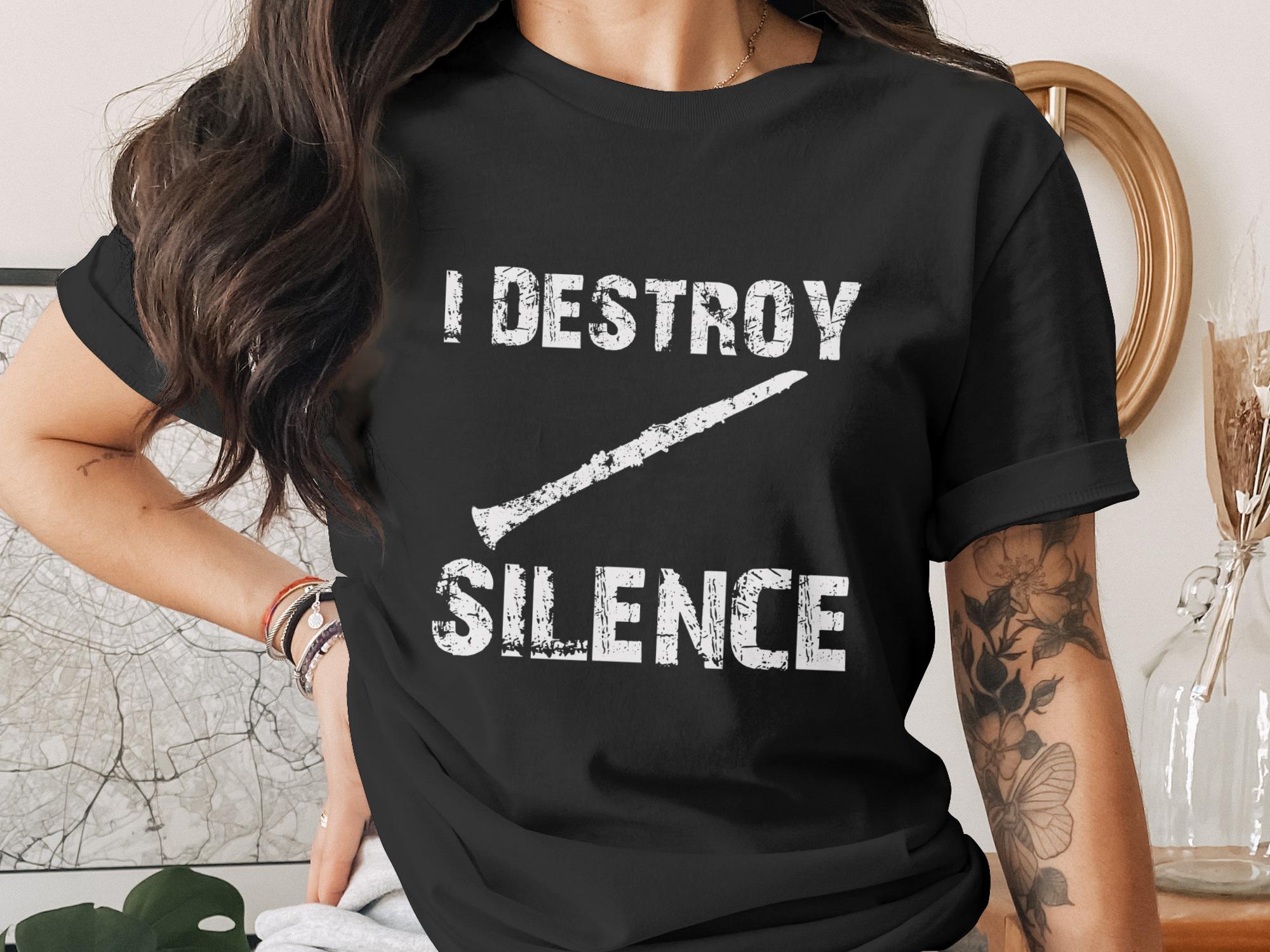 Black t-shirt with white text "I DESTROY SILENCE" and clarinet graphic.