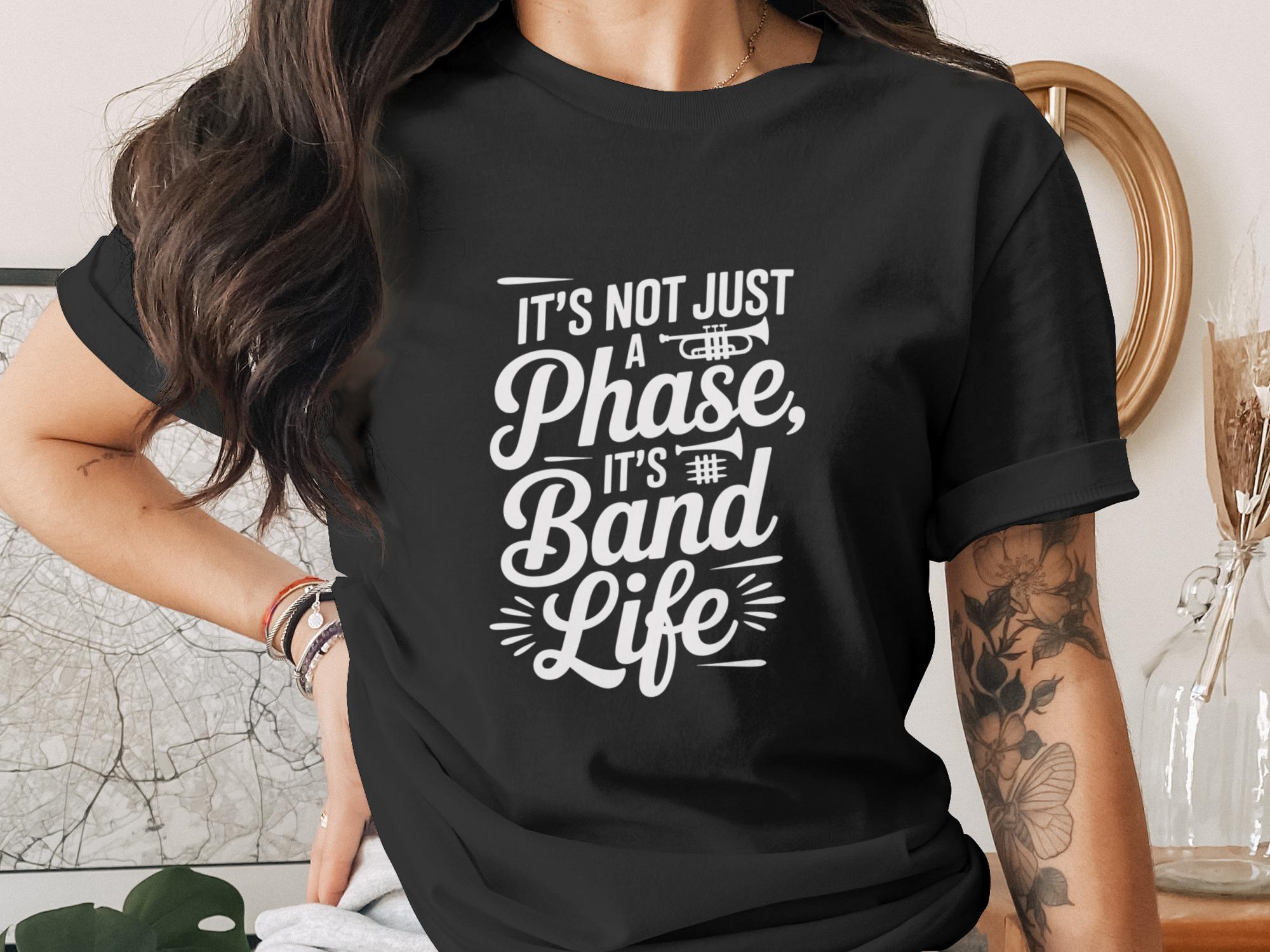 Black t-shirt with white text reading "It's not just a phase, it's band life."