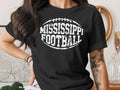 Black t-shirt with "MISSISSIPPI FOOTBALL" in white distressed lettering.