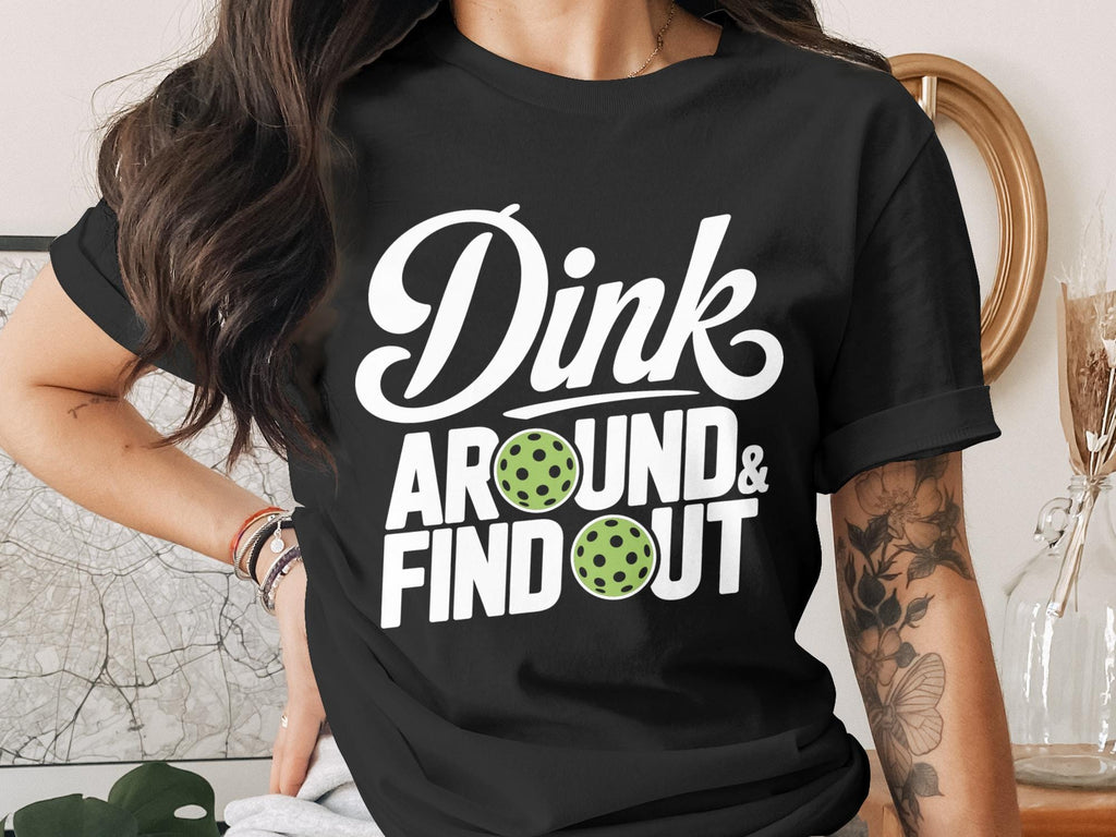 Black t-shirt with "Dink Around & Find Out" text and pickleball graphics.