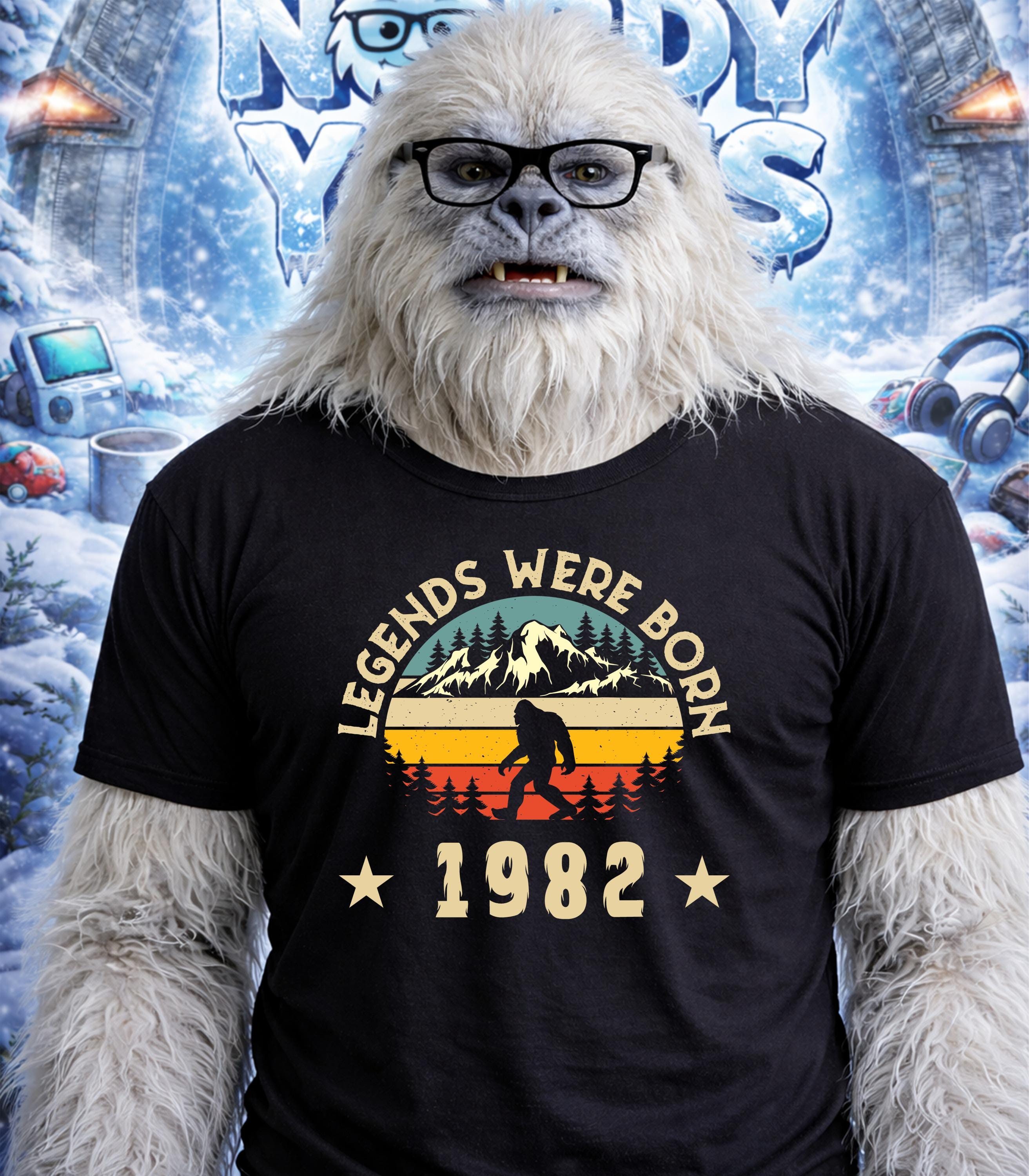 Yeti wearing t-shirt "Legends Were Born 1982" with mountain sunset graphic.