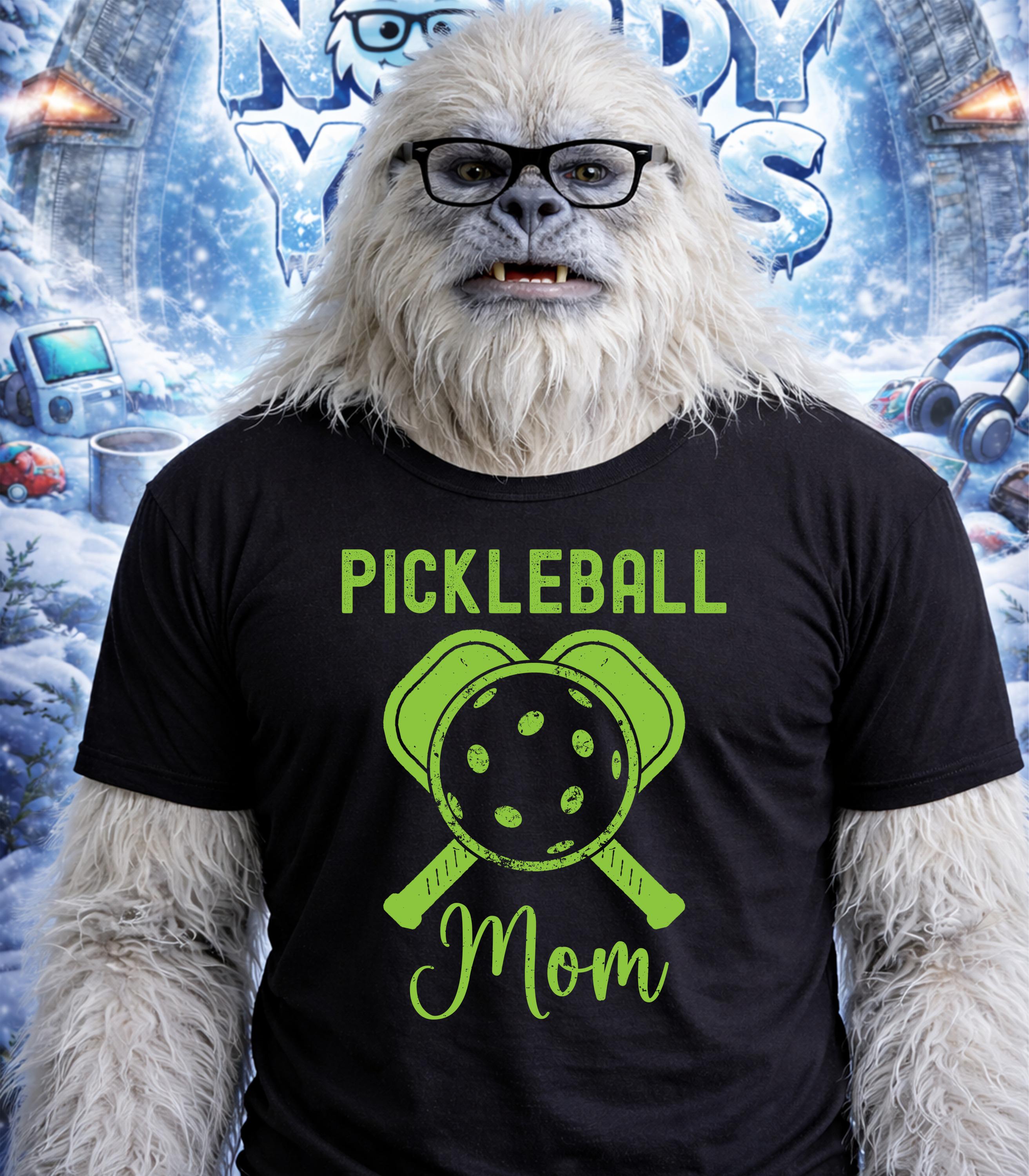 Yeti wearing glasses and a t-shirt that says "Pickleball Mom".