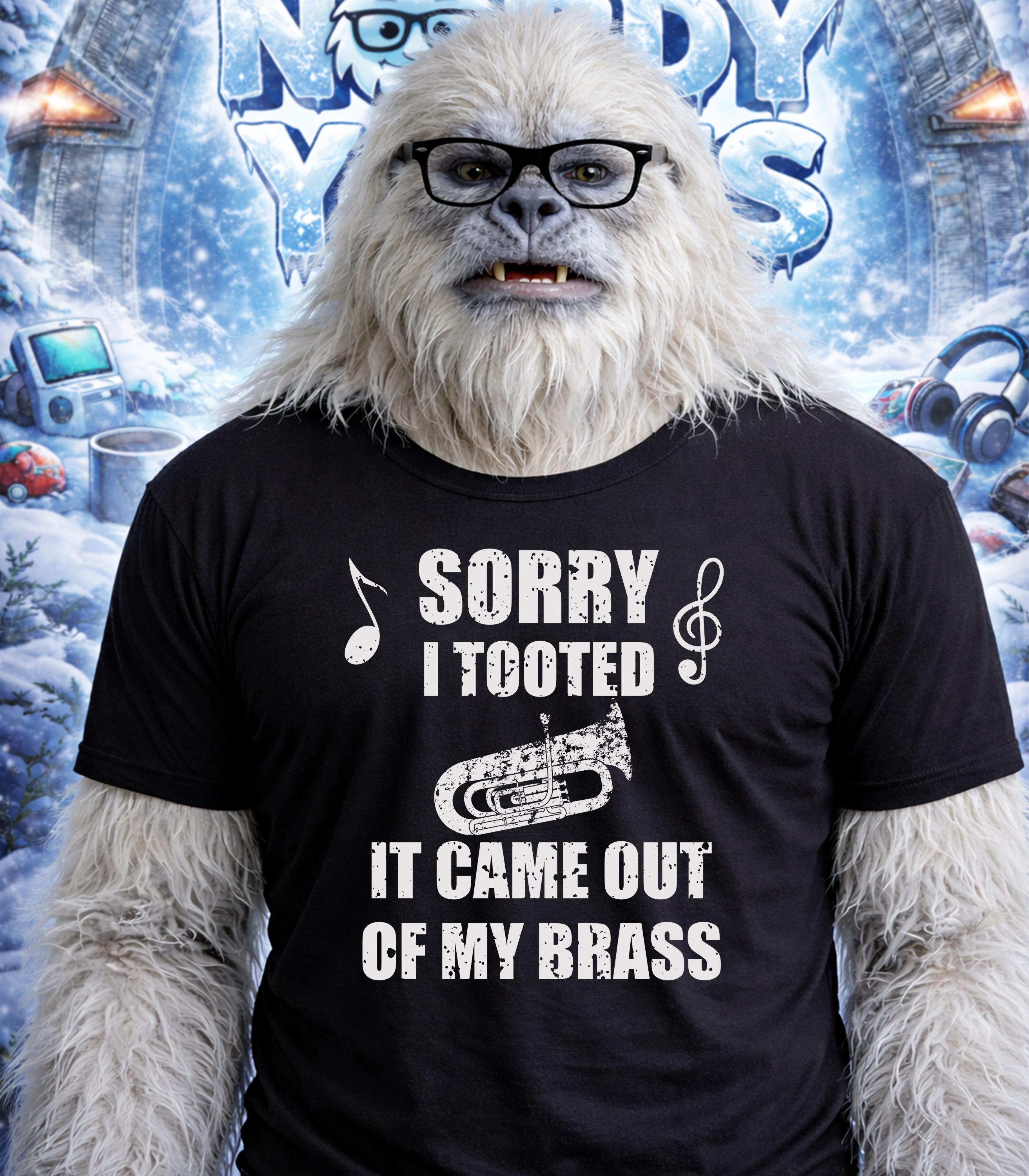 Yeti wearing a t-shirt that says "Sorry I Tooted It Came Out of My Brass".