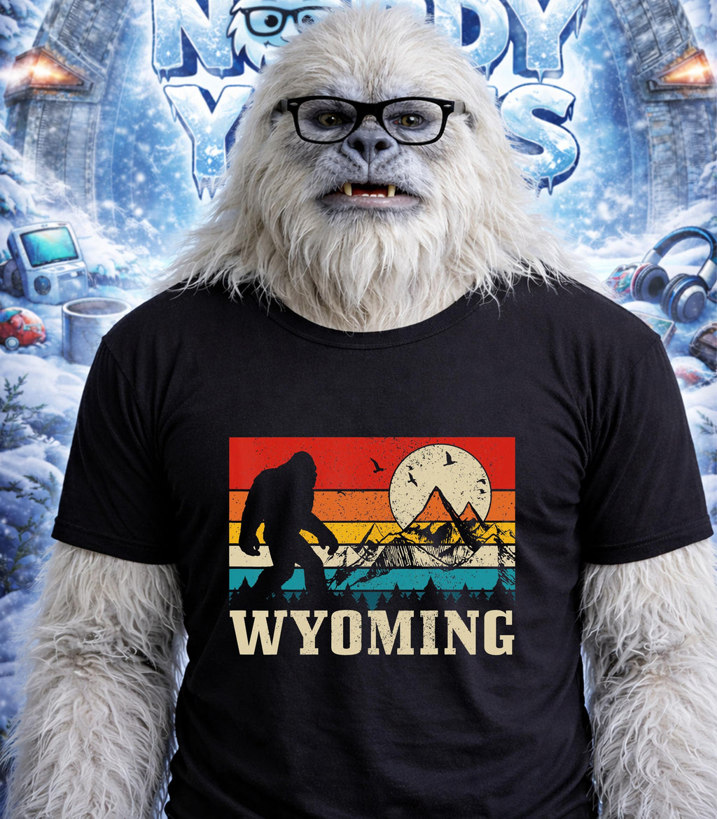 Yeti wearing glasses and a t-shirt with a sunset landscape and "Wyoming" text.