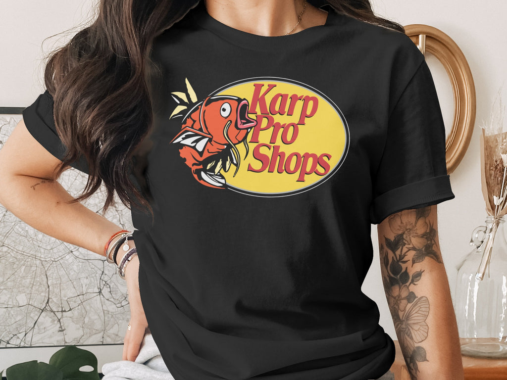 Black t-shirt with "Karp Pro Shops" logo featuring a cartoon fish.