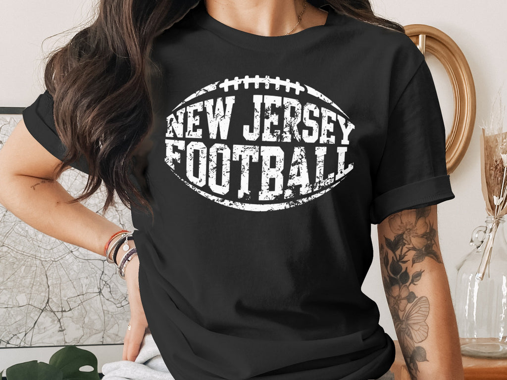 Black t-shirt with "NEW JERSEY FOOTBALL" and a football graphic.