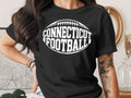 Black t-shirt with white "Connecticut Football" text in a football outline.