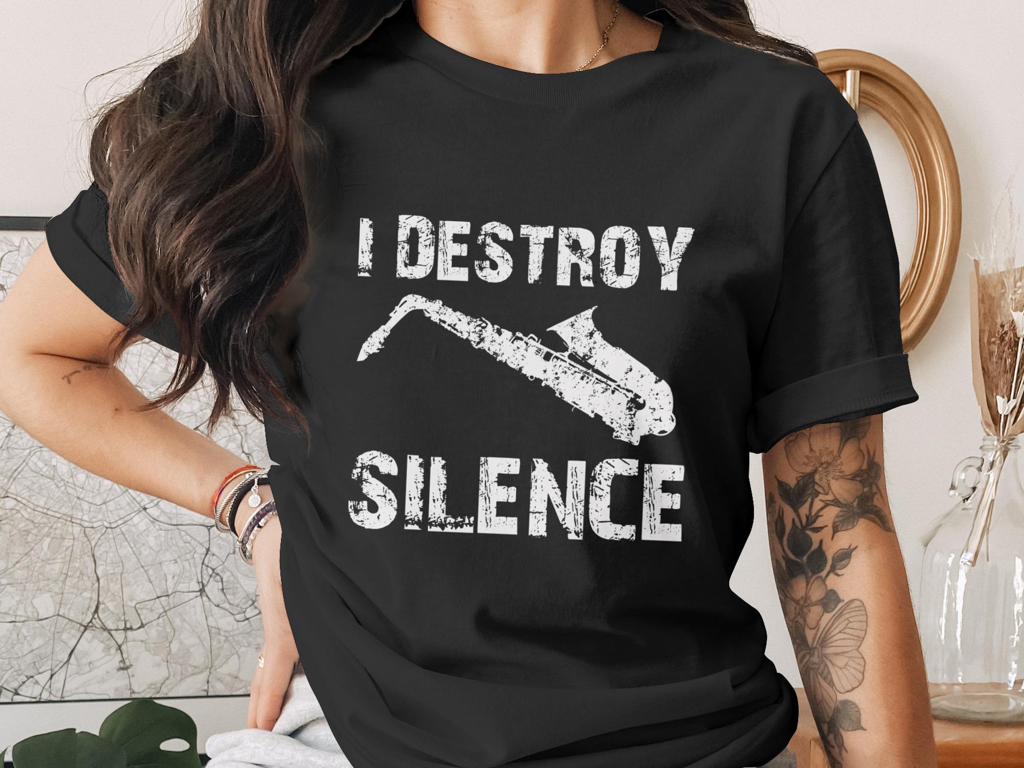 Black t-shirt with white text "I DESTROY SILENCE" and saxophone graphic.
