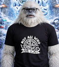 Yeti wearing glasses and a black t-shirt with "Not All Who Wander Are Lost" text.