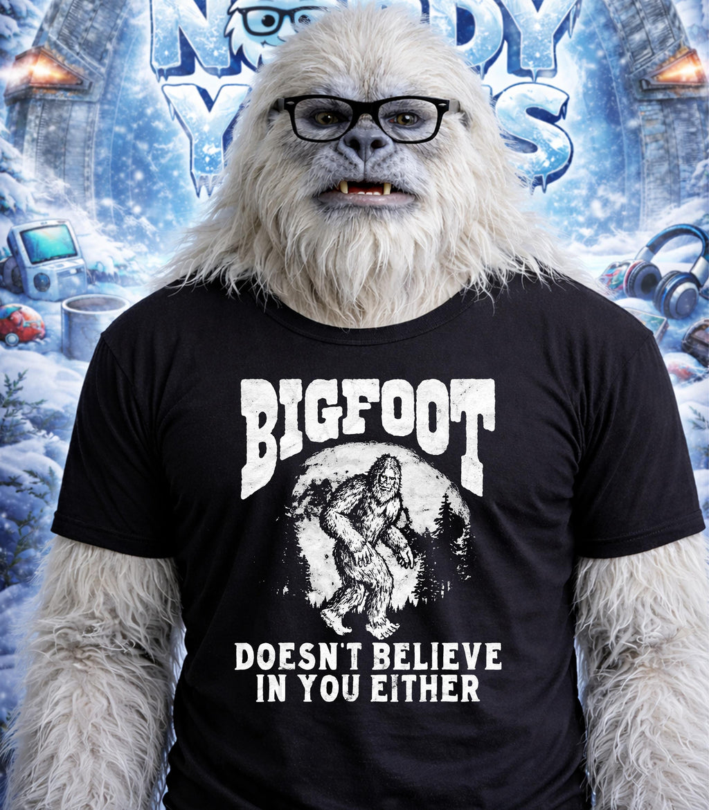 Yeti wearing glasses and a t-shirt that says "Bigfoot Doesn't Believe In You Either."