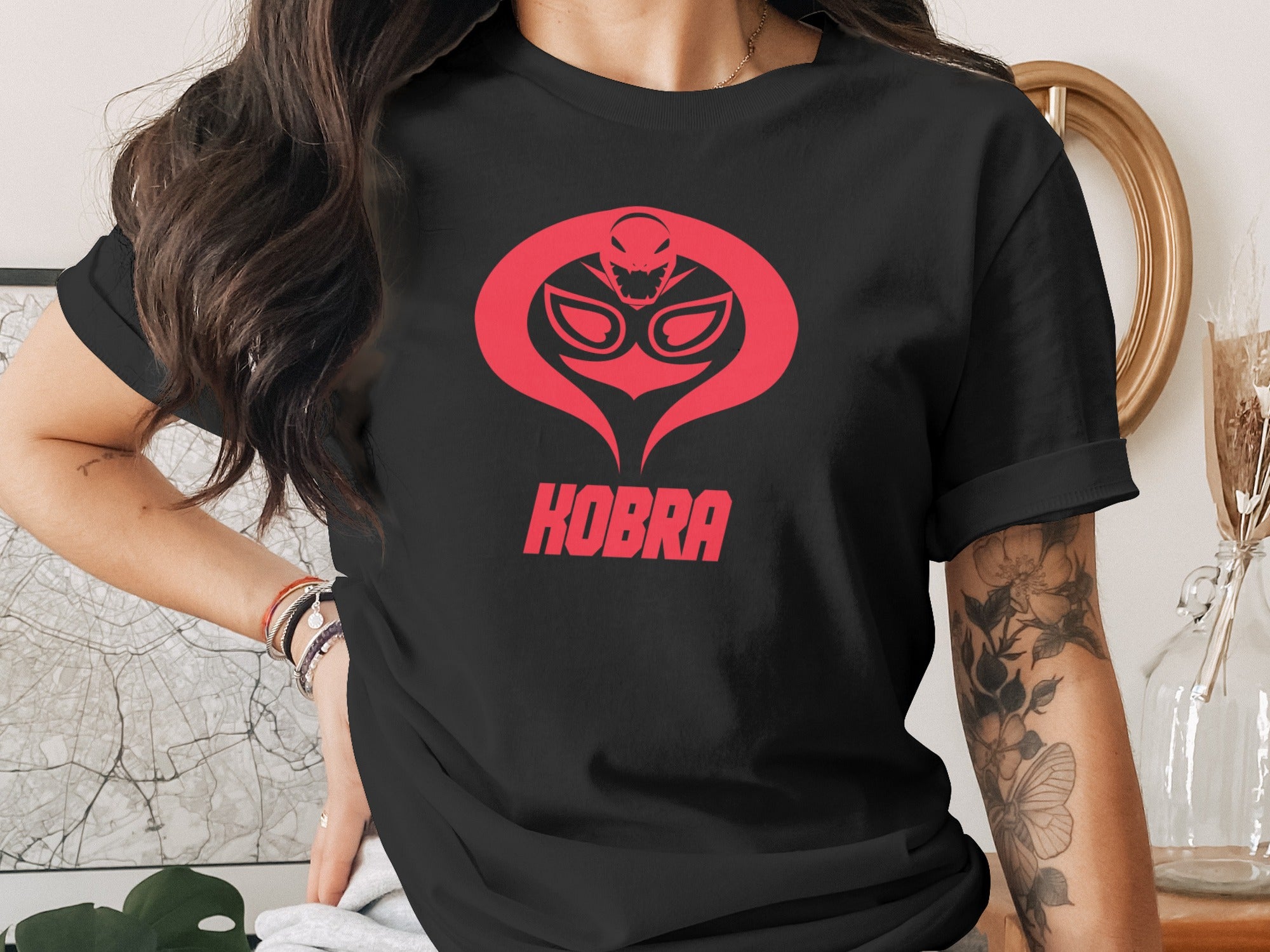 Black t-shirt with red Cobra Kai logo and text.