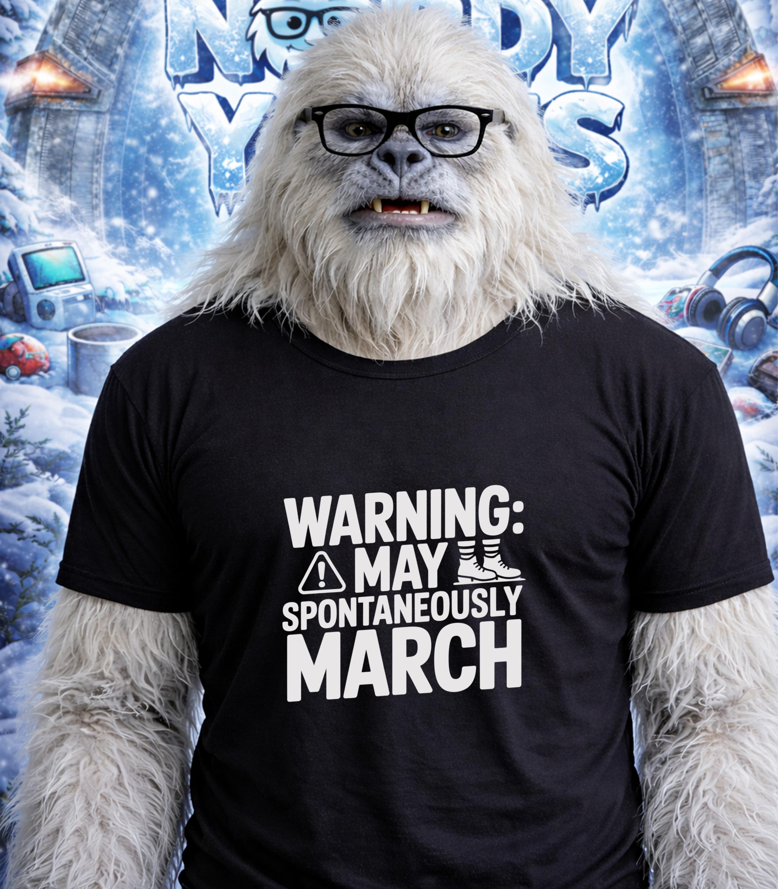 Yeti wearing glasses and a t-shirt that says "WARNING: MAY SPONTANEOUSLY MARCH."