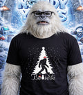 Yeti wearing glasses and a t-shirt with a Bigfoot and "Believe" design.