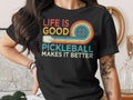 Black t-shirt with "Life Is Good Pickleball Makes It Better" and retro graphic.