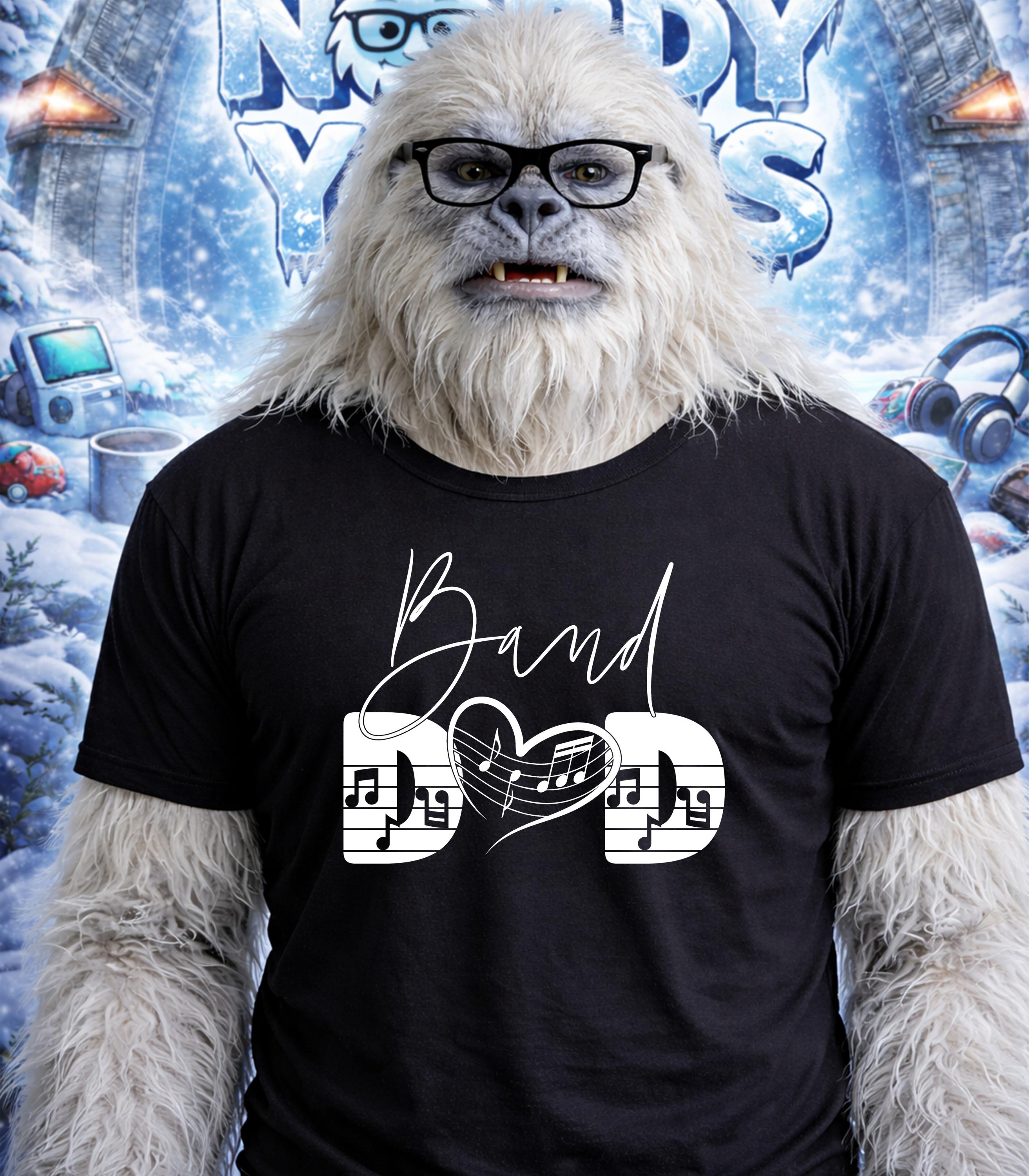 Yeti wearing glasses and a black t-shirt with "Band Dad" and musical notes.