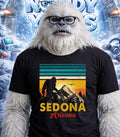 Yeti wearing t-shirt with Sedona Arizona sunset graphic.