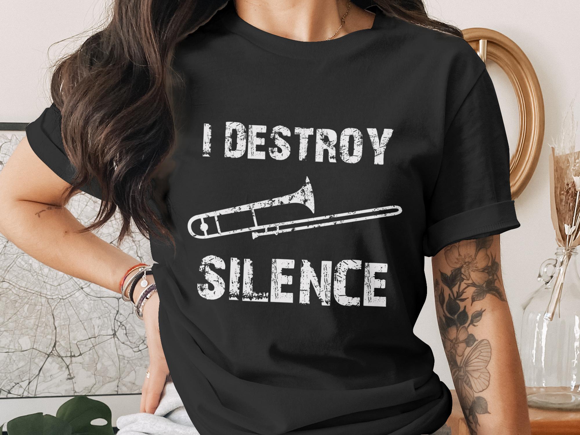 Black t-shirt with "I DESTROY SILENCE" and a trombone graphic.